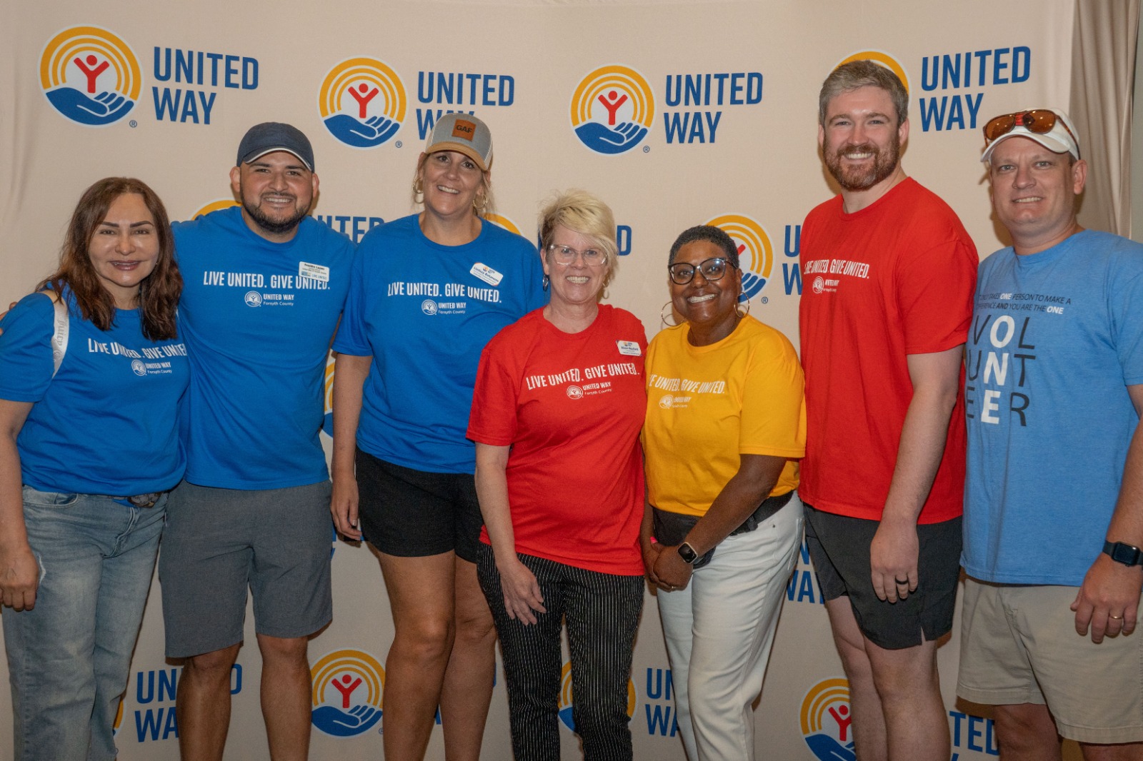 Volunteers packing meals during Day of Caring at the Forsyth Conference Center.
